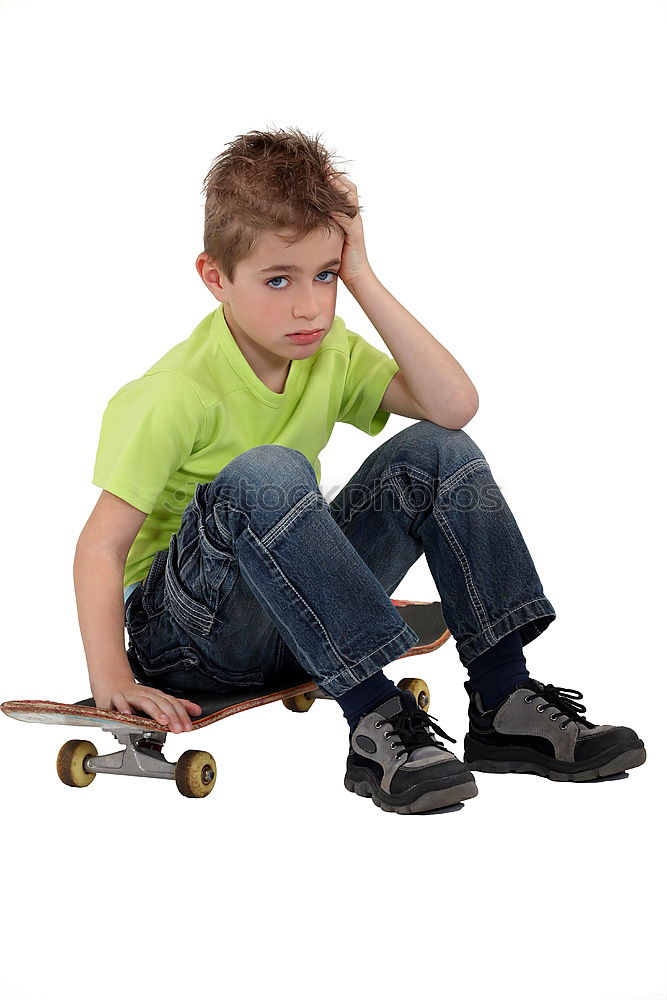 Similar – Image, Stock Photo A smiling boy with skateboard sitting alone on the floor