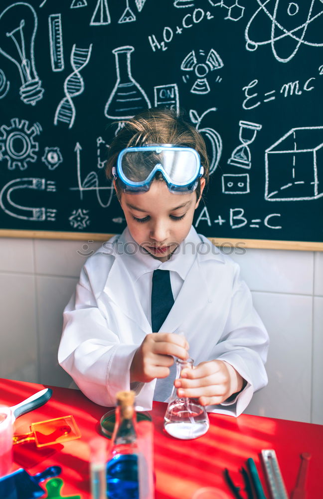 Similar – Image, Stock Photo Boy playing with chemistry game