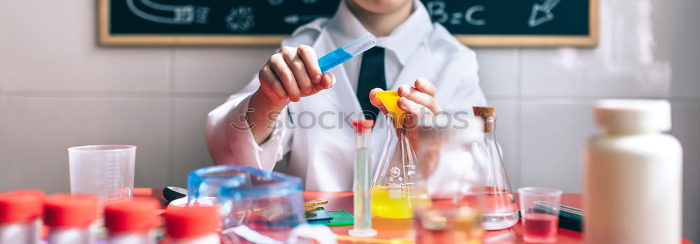 Similar – Image, Stock Photo Boy playing with chemistry game