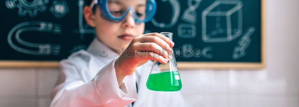 Similar – Child dressed as a scientist and chalkboard