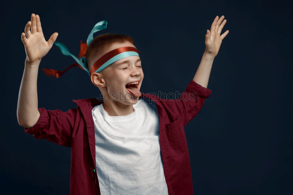 Similar – Image, Stock Photo surprised child in New Year’s Eve on black background
