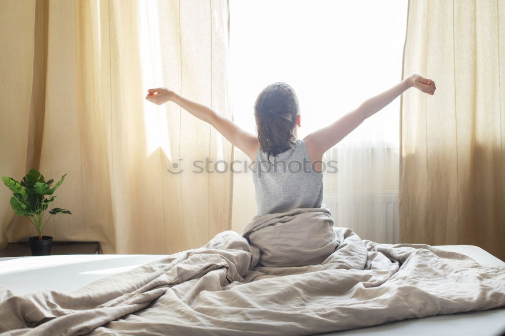 Similar – Image, Stock Photo Woman lying with legs up