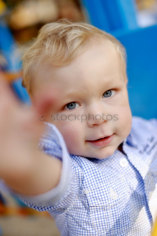 Similar – Happy baby playing with toy blocks.