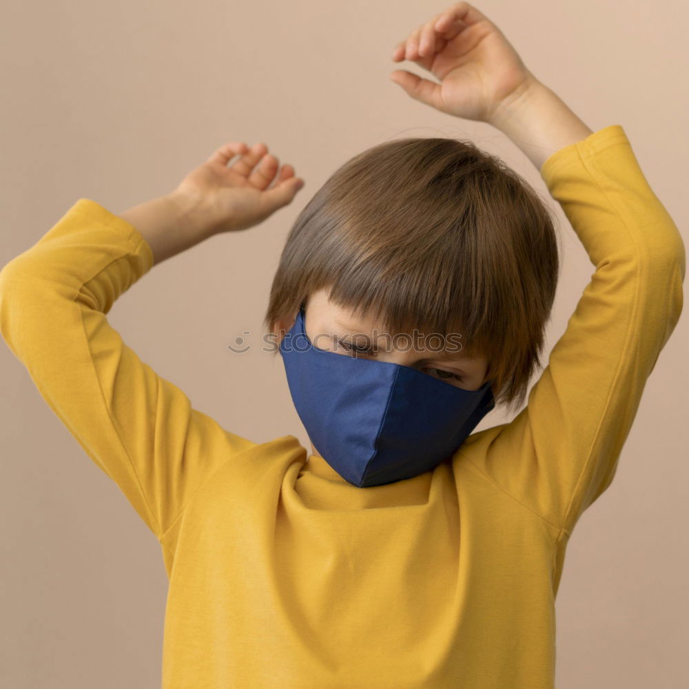 Similar – Foto Bild Niedlicher kleiner Junge in medizinischer Maske