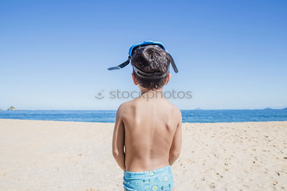 Similar – Image, Stock Photo Mother throwing sunscreen on her little daughter on a tropical beach