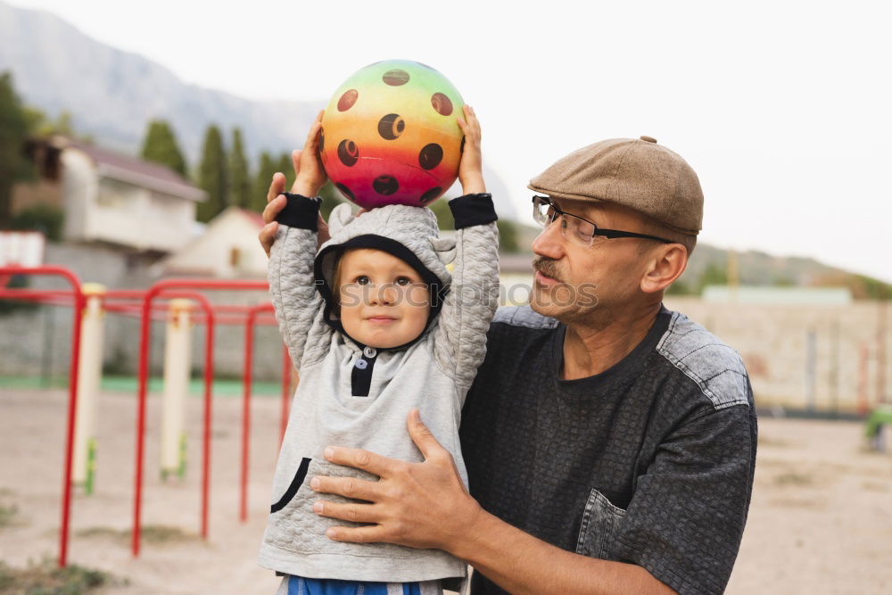 Image, Stock Photo Grandfather and grandson with a electric wheelchair