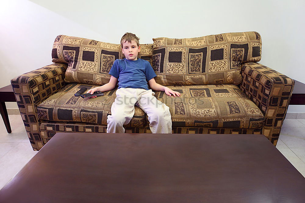 Similar – Image, Stock Photo Woman at home reading in an armchair