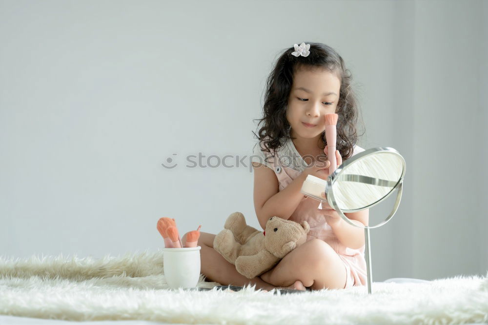 Similar – Little girl wearing rabbit ears