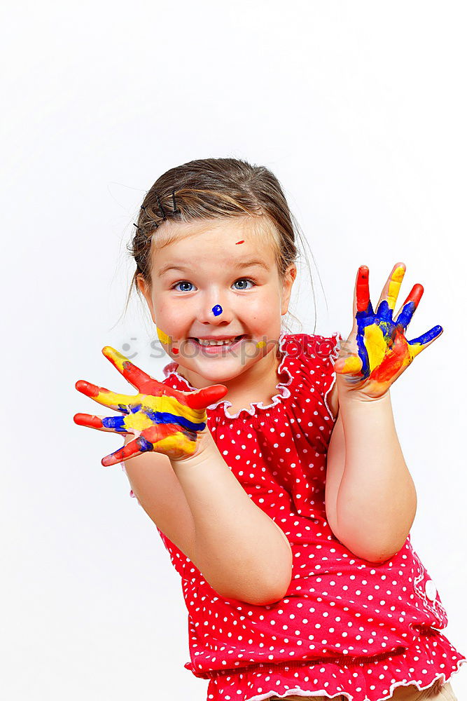 Similar – Girl with clown nose looks into the camera