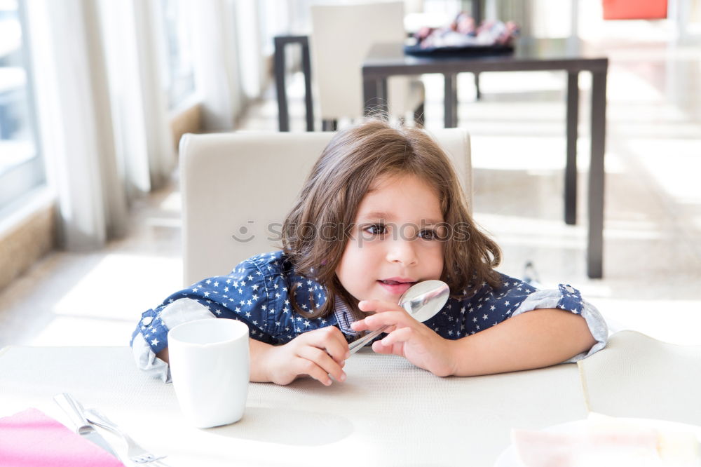 Similar – Image, Stock Photo Little kid on Christmas day on the bed with a gift