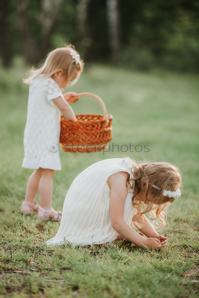 Similar – Image, Stock Photo Boy and girl picking up garbage from ground