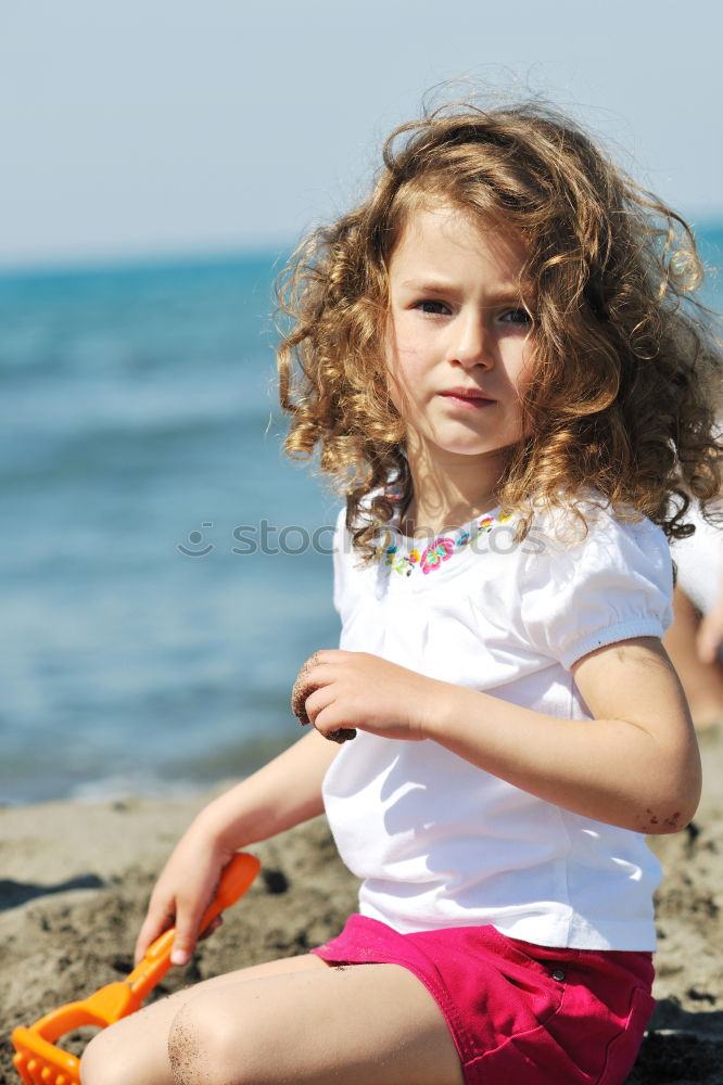 Similar – Image, Stock Photo child playing with sand