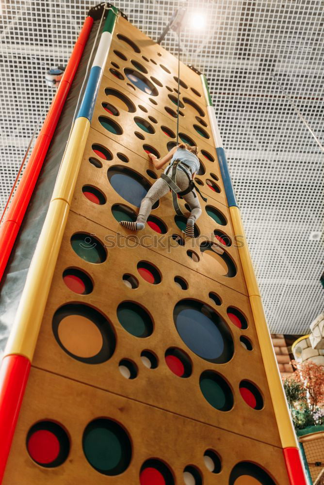 Similar – Climbing wall on brick wall