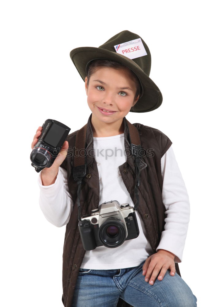 Similar – Image, Stock Photo Beautiful girl disguised of witch decorating a pumpkin at home.