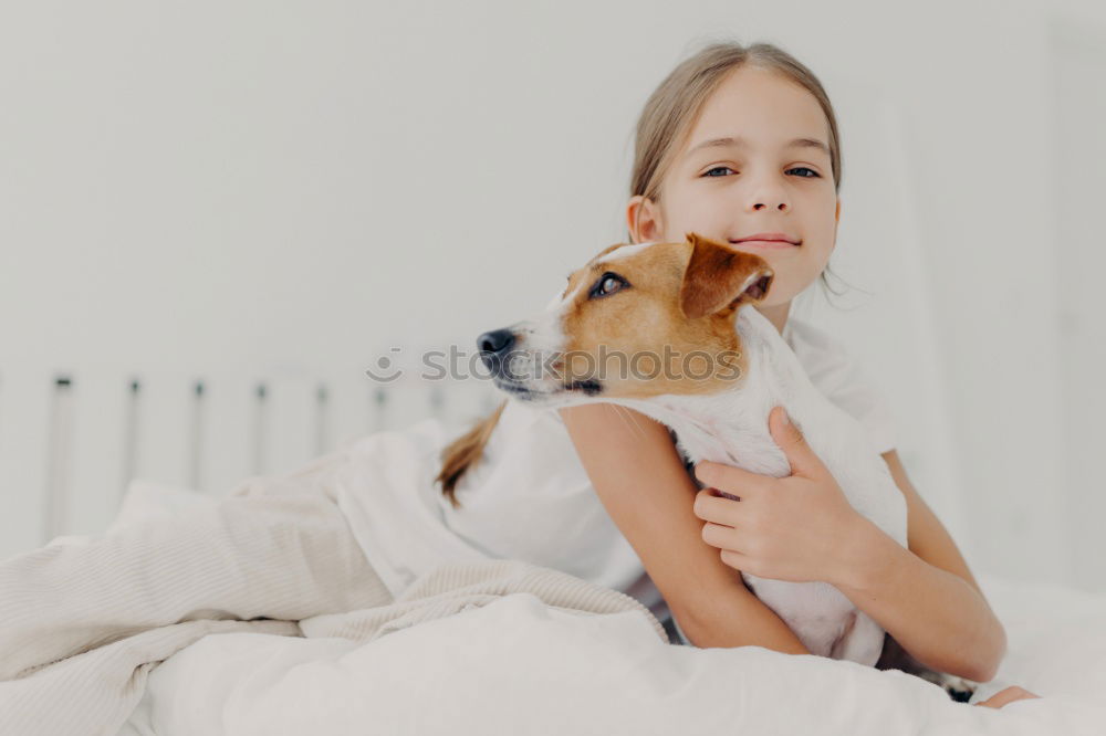 Similar – happy little child girl lying on her bed in the morning