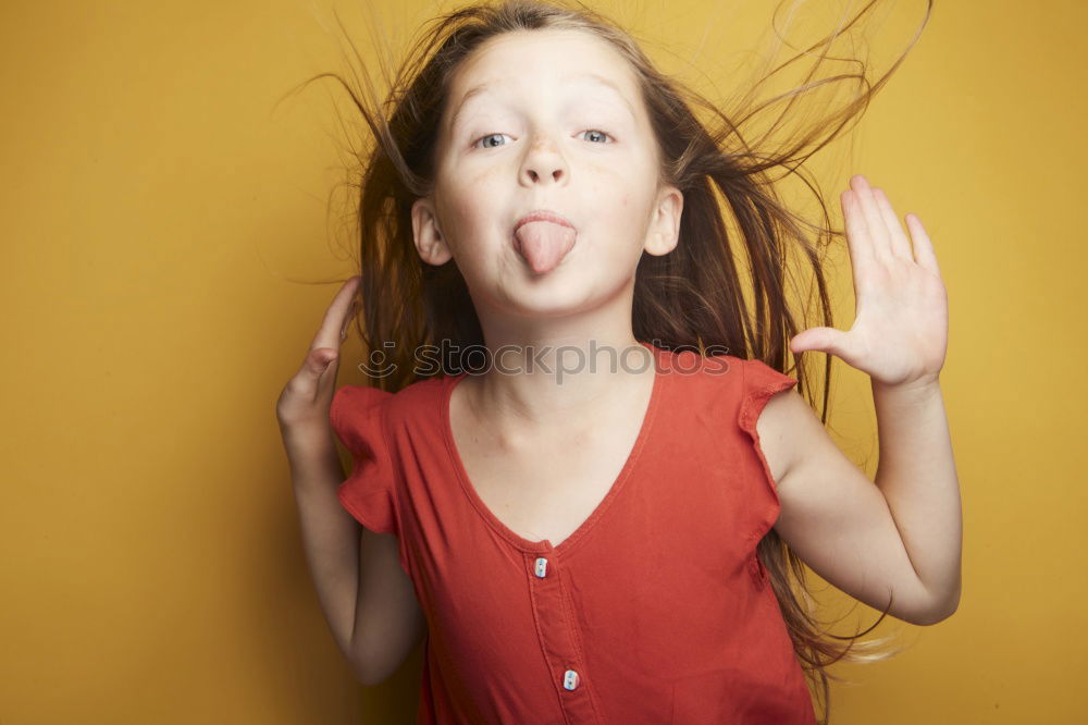 Image, Stock Photo Young woman with a cross covering her mouth