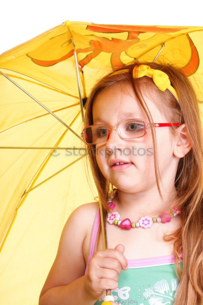 Similar – happy kid girl hiding under umbrella