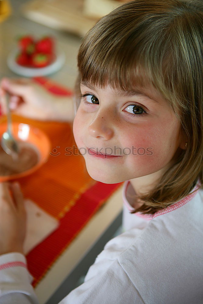 Image, Stock Photo Portrait of little girl preparing baking cookies.