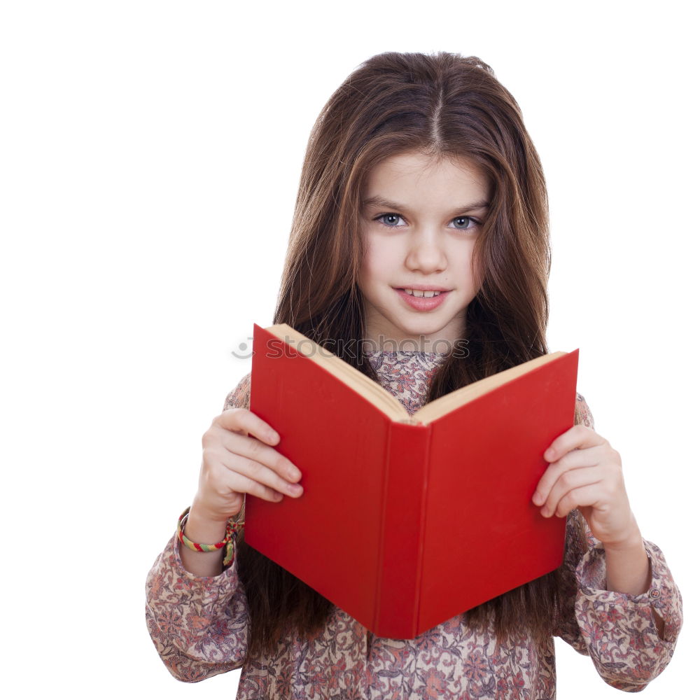 Similar – boy reading books on gray background