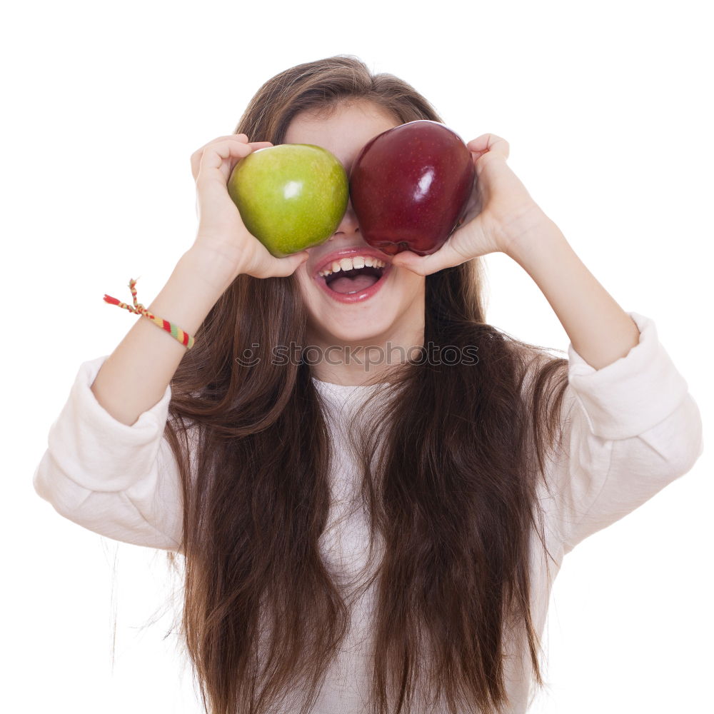 Similar – Young woman pulling funny face holding donuts in hands