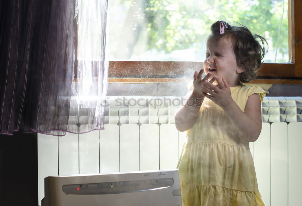 Similar – Image, Stock Photo Girl looks at dress against light from window