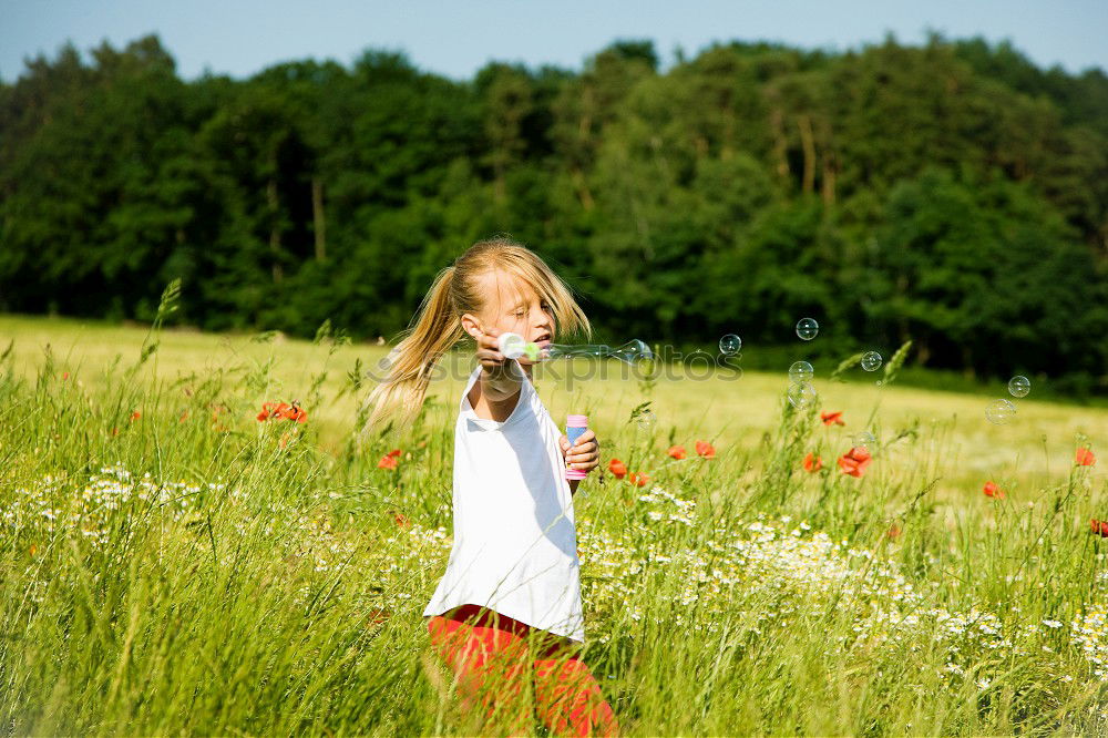 Similar – meadow child Human being