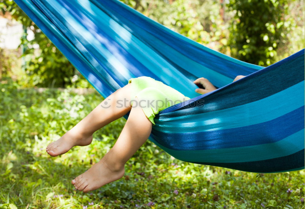 Image, Stock Photo Holiday in the garden with a delicious drink in your hand and your feet in the hammock; pure relaxation