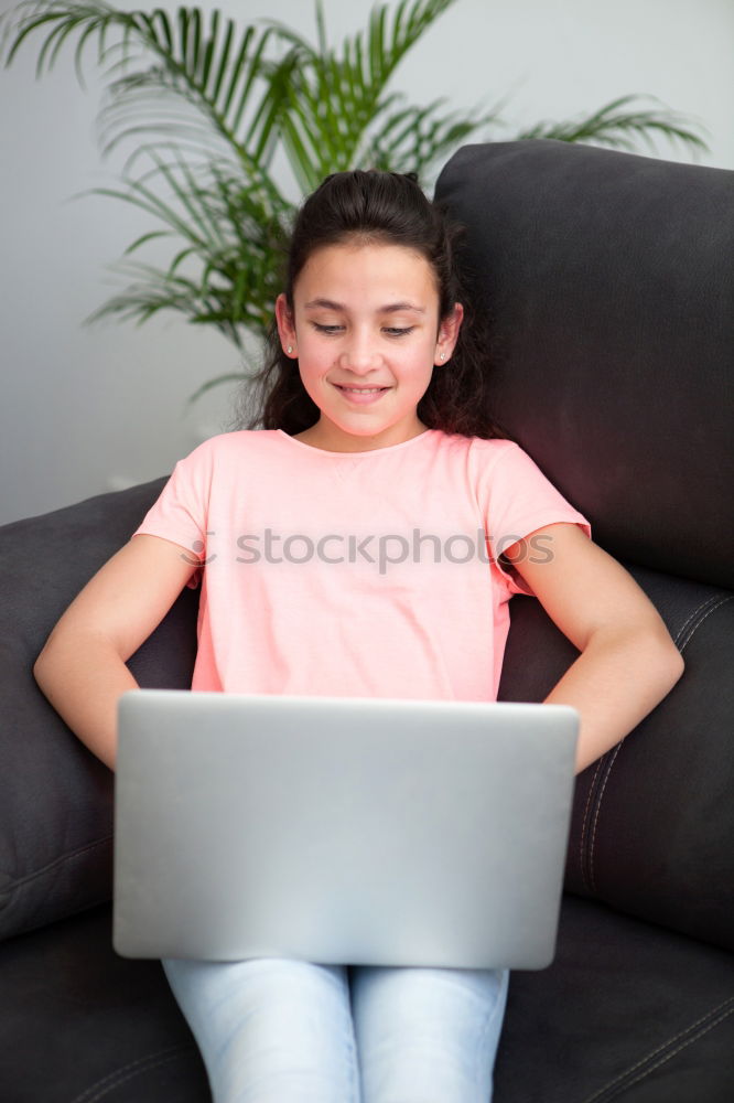 Similar – Little girl using a tablet at home