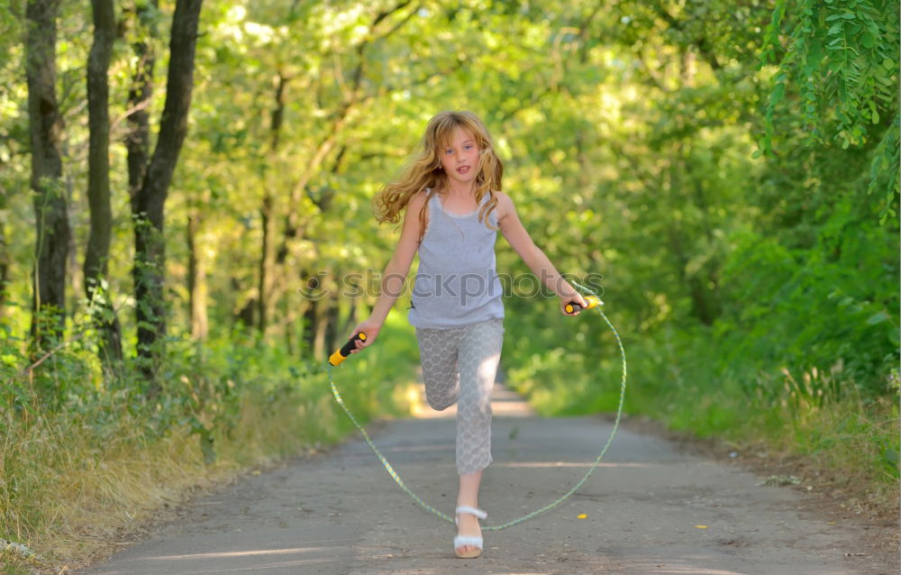 Similar – Image, Stock Photo Athletic woman out jogging in a forest