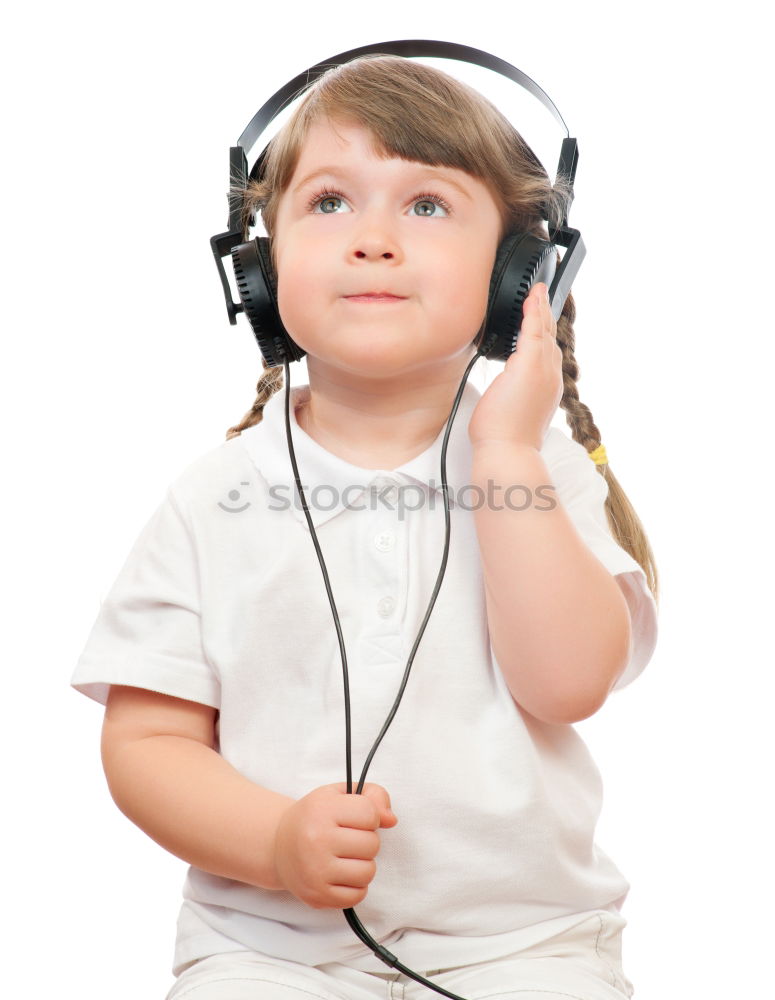 little boy with headphones