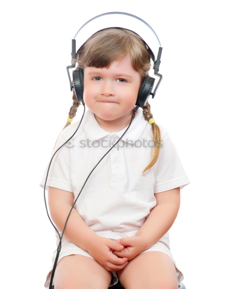 Similar – little boy with headphones