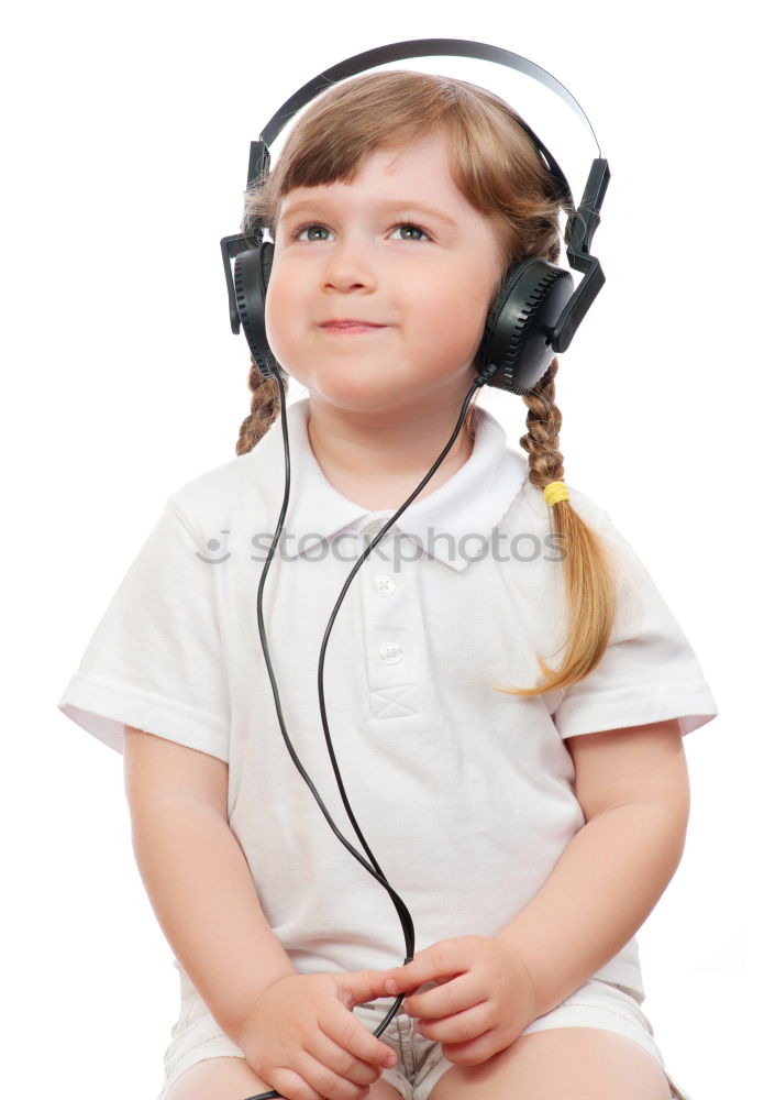 Similar – little boy with headphones