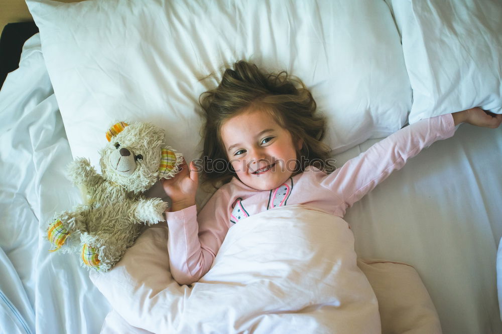 Similar – happy child girl wake up in the early morning