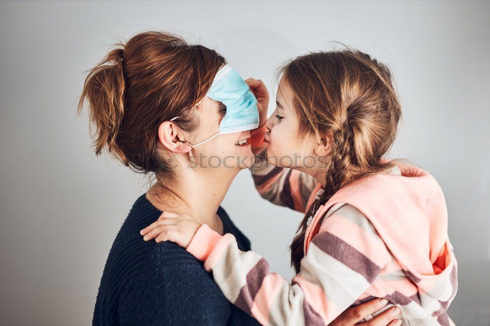 Similar – indoor portrait of happy mother comforting toddler son