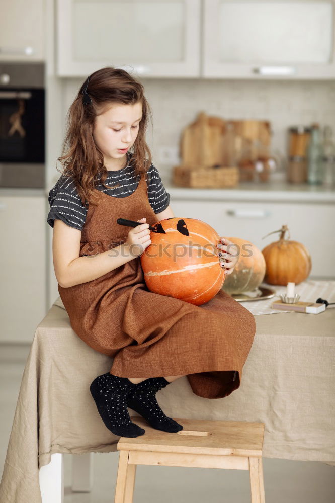 Similar – child girl having breakfast at home