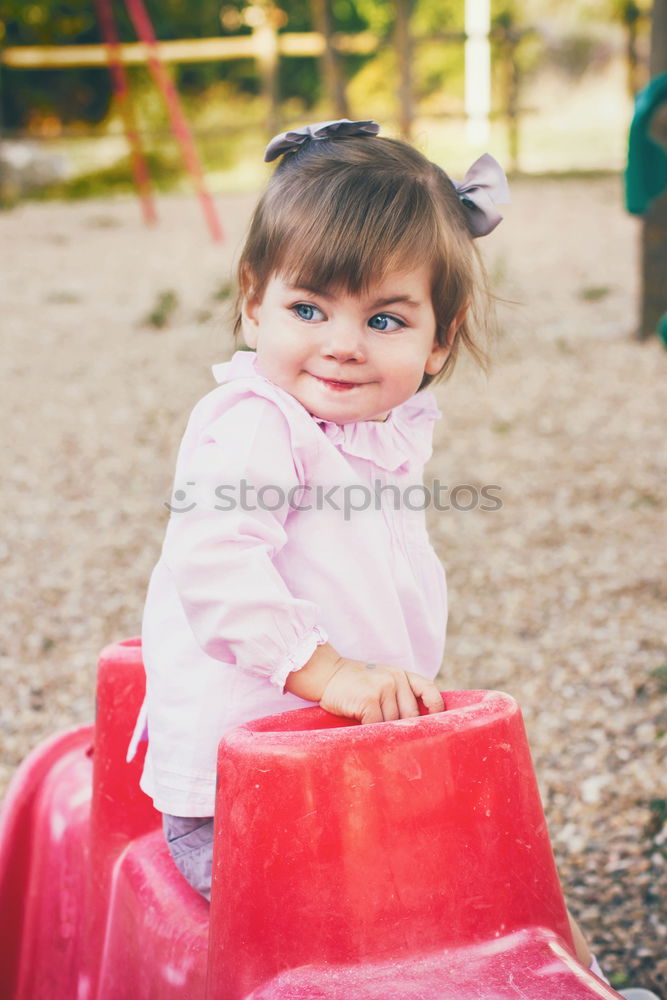 Lovely little girl in a park