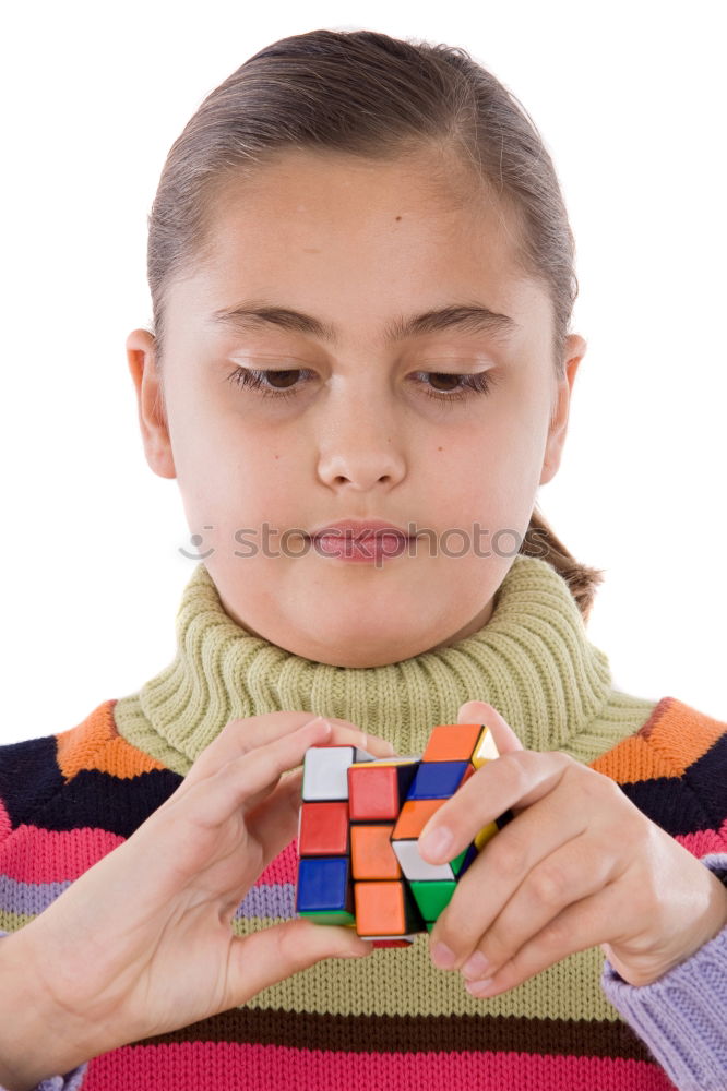 Similar – Girl decorating Christmas gingerbread cookies with chocolate