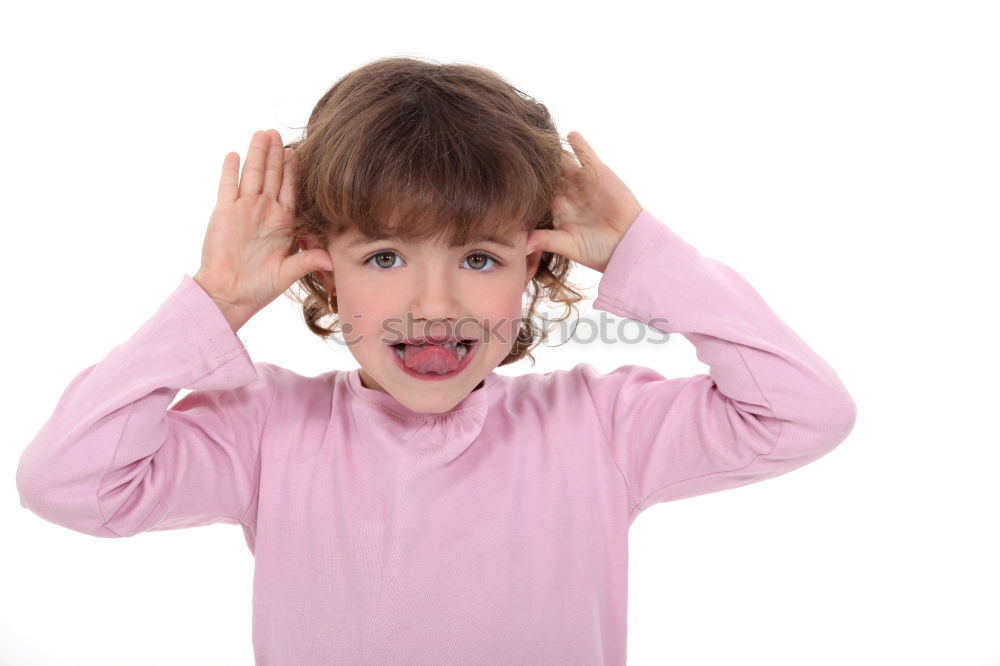 Similar – portrait of a Screaming little boy covering ears with hands