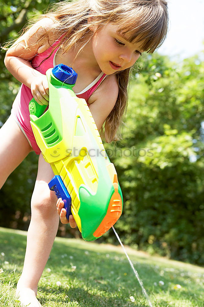 Similar – Image, Stock Photo Children play mini golf in the garden
