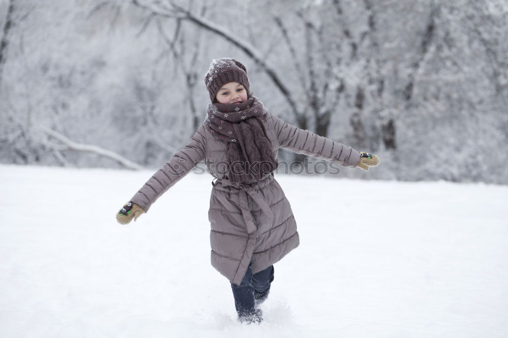 Image, Stock Photo kid girl helping to clean pathway from snow with showel