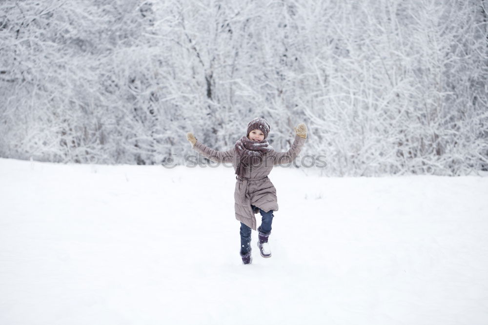 Similar – Image, Stock Photo Young woman enjoying a snowy winter day