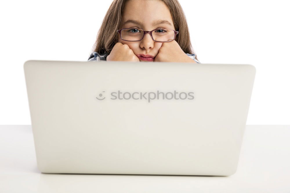 Image, Stock Photo Young desperate student with glasses looks over a laptop