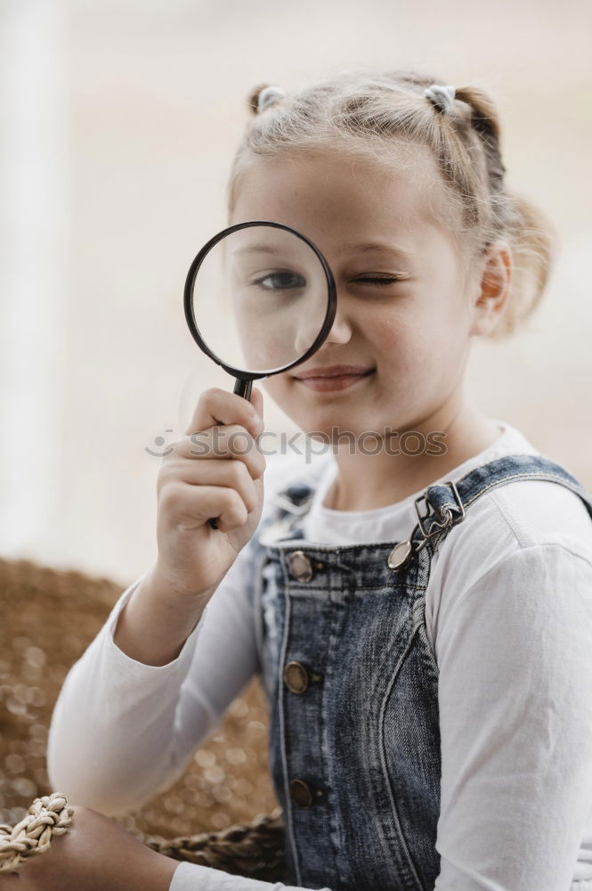 Similar – Cute schoolgirl posing in a classroom