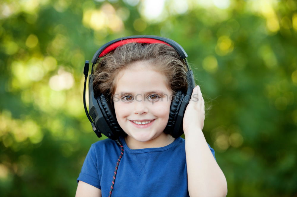 Similar – Image, Stock Photo Little girl with headphones outside