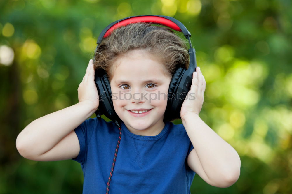 Similar – Image, Stock Photo Little girl with headphones outside