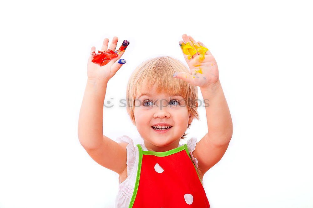 Similar – smiling baby with an orange on blue background