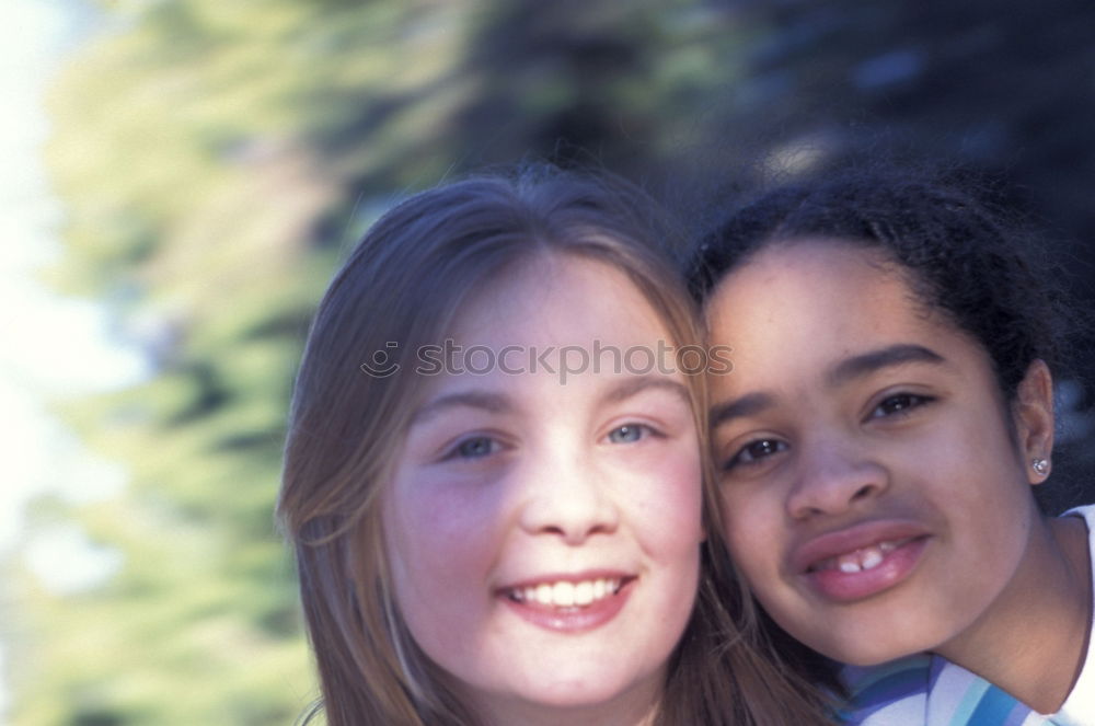 Similar – Image, Stock Photo Two happy girls in the park with coats