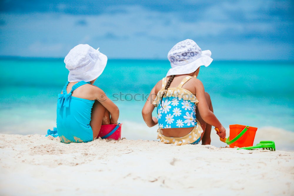 Similar – Image, Stock Photo Two happy children playing on the beach