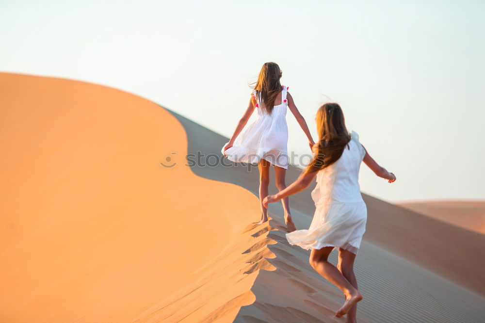 Similar – Happy women walking on hill