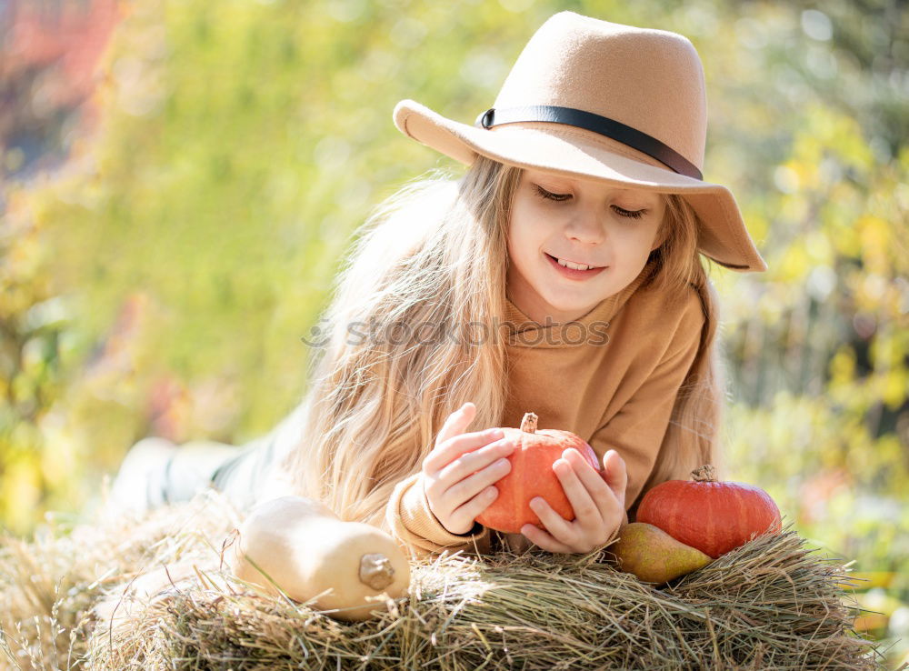 Similar – Image, Stock Photo Young cowgirl in a field of cereals